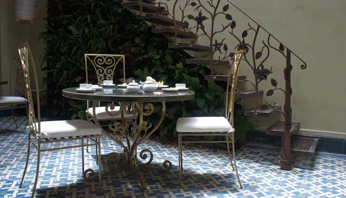 Comedor orquídea en hierro